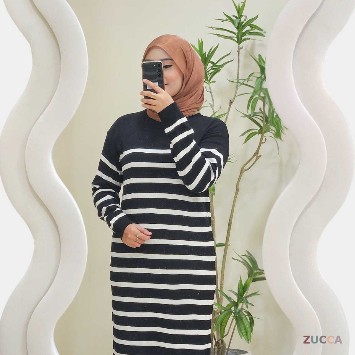 Huda 162CM/65KG wearing free size